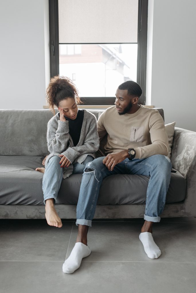 Couple discussing relationship problems, infidelity concerns and rebuilding trust