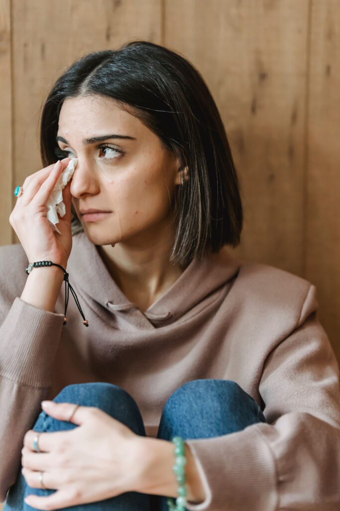 Person reflecting on negative self-talk and building self-confidence