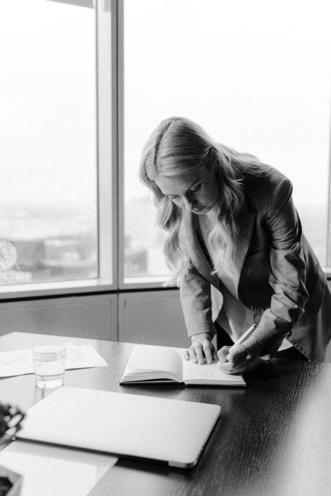 Datingsitesreviews.com Corporate woman at work stressed and tired of being single