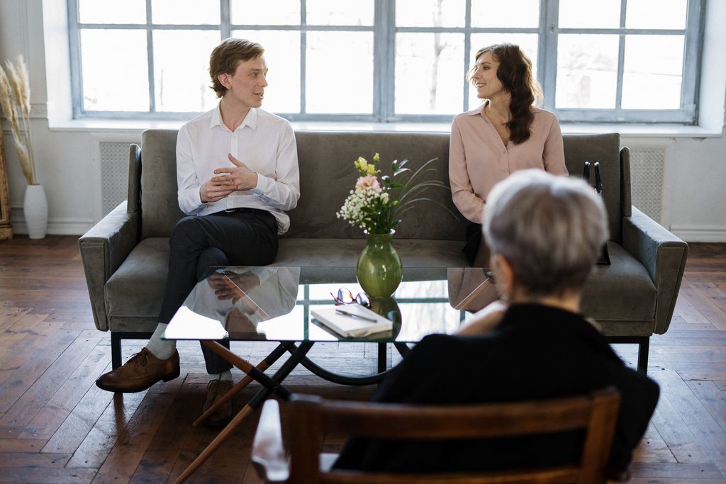 Couple attending a marriage counselling session in London to improve communication and rebuild trust.
