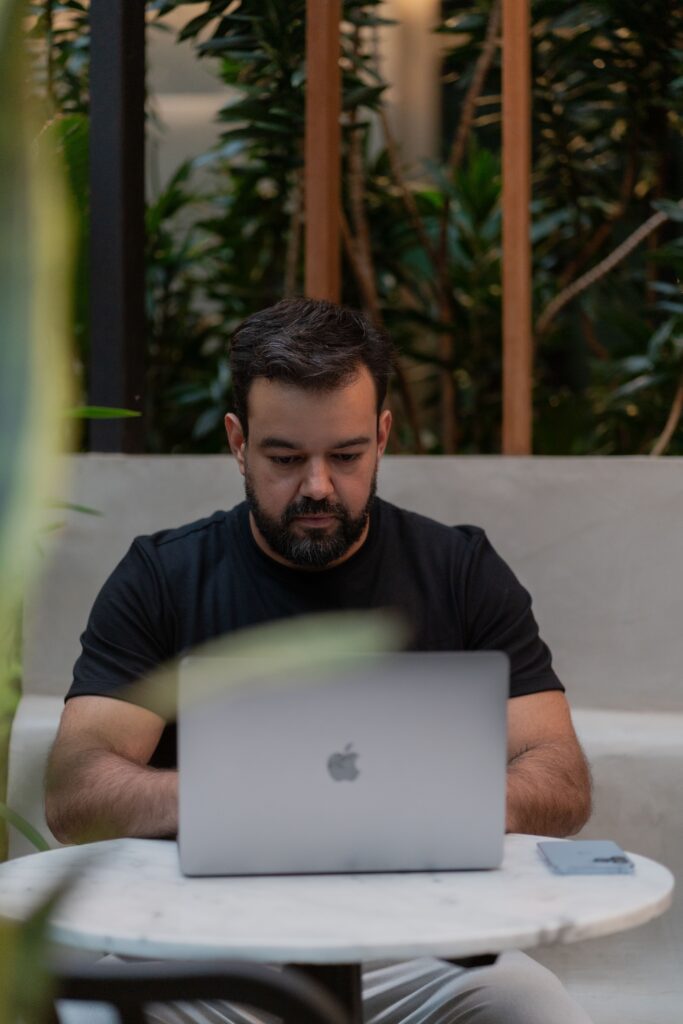 double text meaning man on laptop
