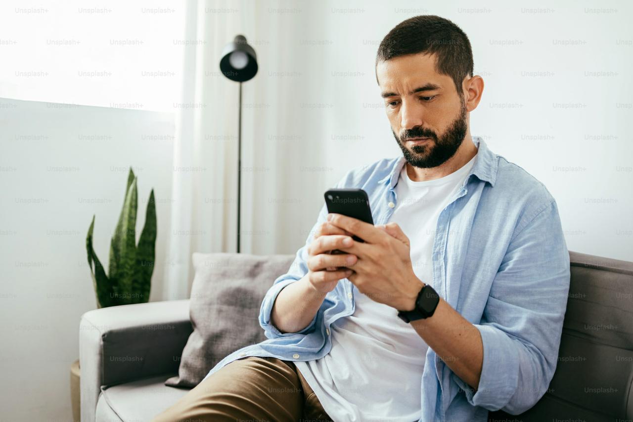 Professional man using dating app on smartphone – dating strategy for busy singles