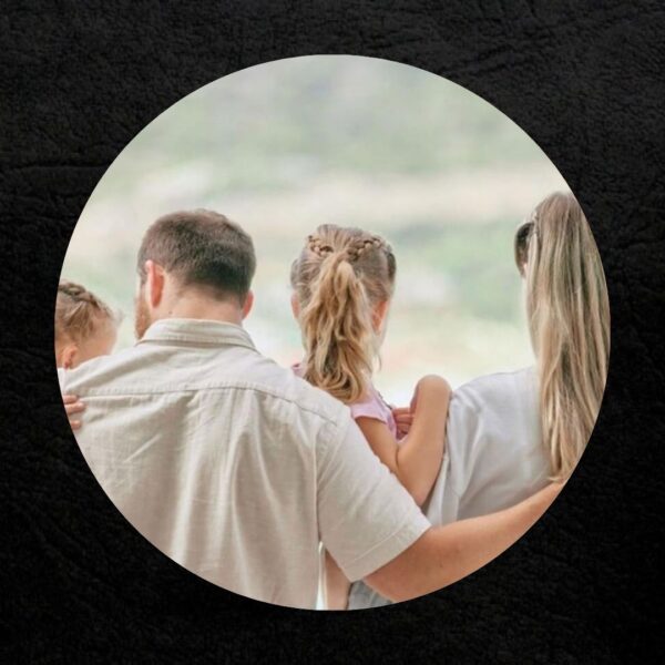 Local family therapy session helping parents and children resolve conflict and improve communication in a calm, supportive setting