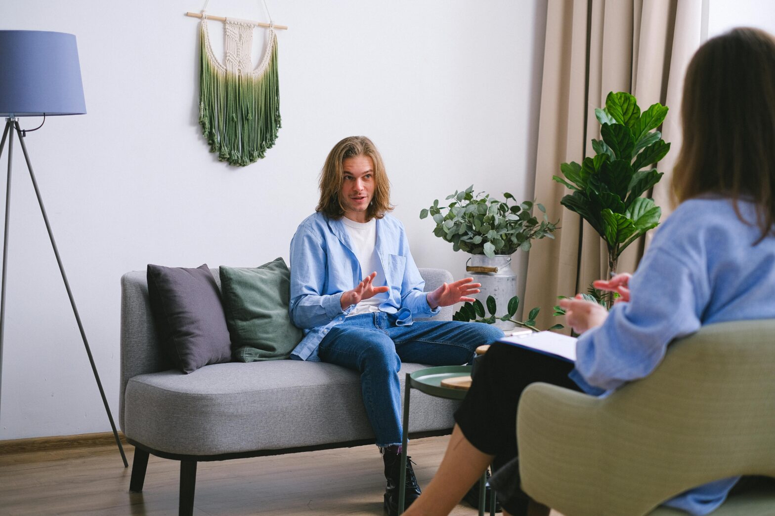 Client at Miss Date Doctor talking to therapist after book therapy session london