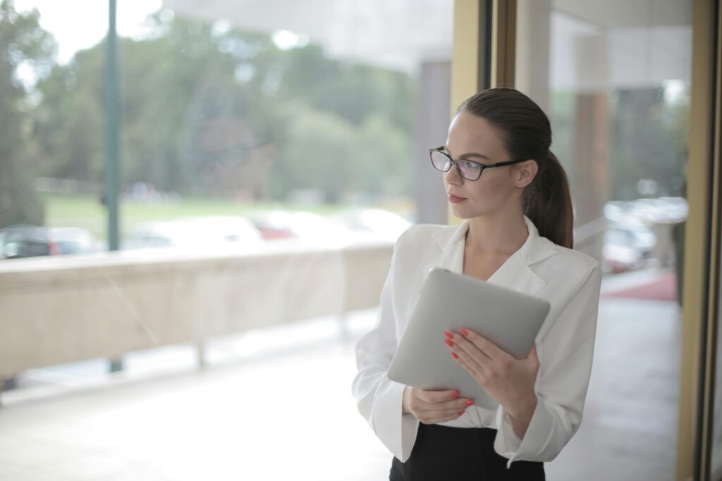woman looking out window 1-2-1 relationship coach in London